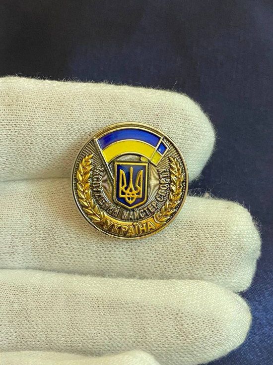 Значок "Заслужений тренер України" 25х2,5 мм (27588)