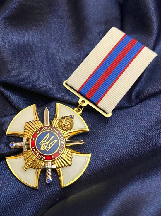 Нагрудний знак "За сприяння державній охороні України" УДО 46х46х3мм (33740)