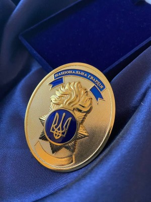 Жетон НГУ на закрутці  58х70х2мм (30968)