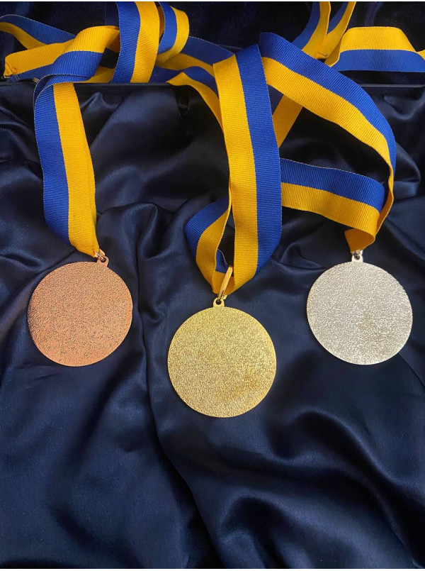 Медалі 