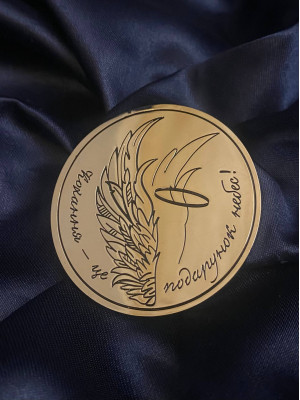 Монета лазерним гравіюванням 